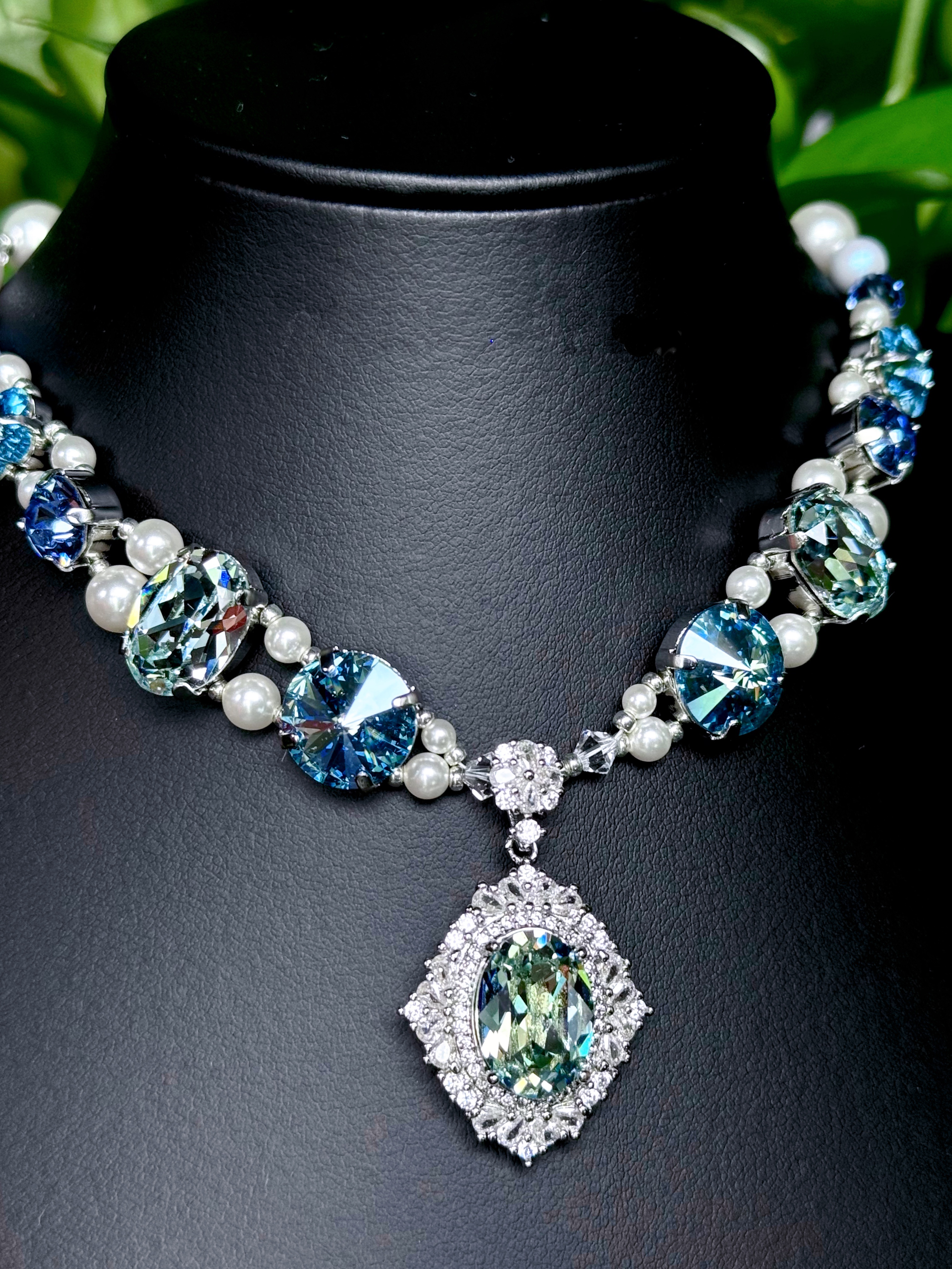 Luxury handmade pet necklace, mixed blue crystal & white pearls, large oval aquamarine pendant with rhinestone halo, displayed on black bust form, small dog wedding jewelry