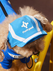 Dog model wearing glacier blue pet sun baseball cap and matching outfit, side shot, outdoor dog sun hat