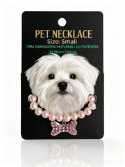 Pearl pet necklace with crystal bone charm on a small dog
