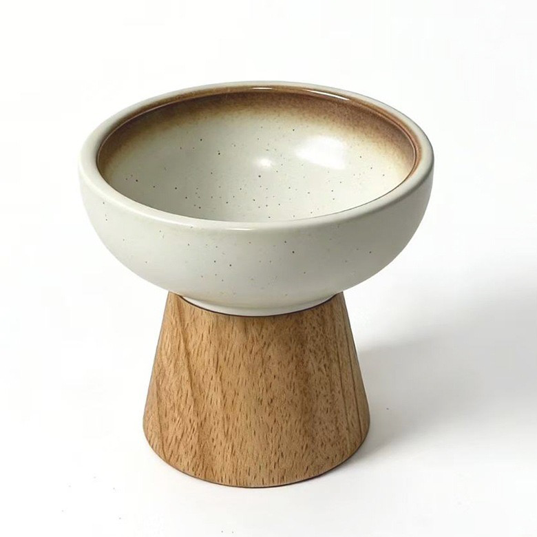 Single elevated ceramic cat bowl solid wood base, product shot white background